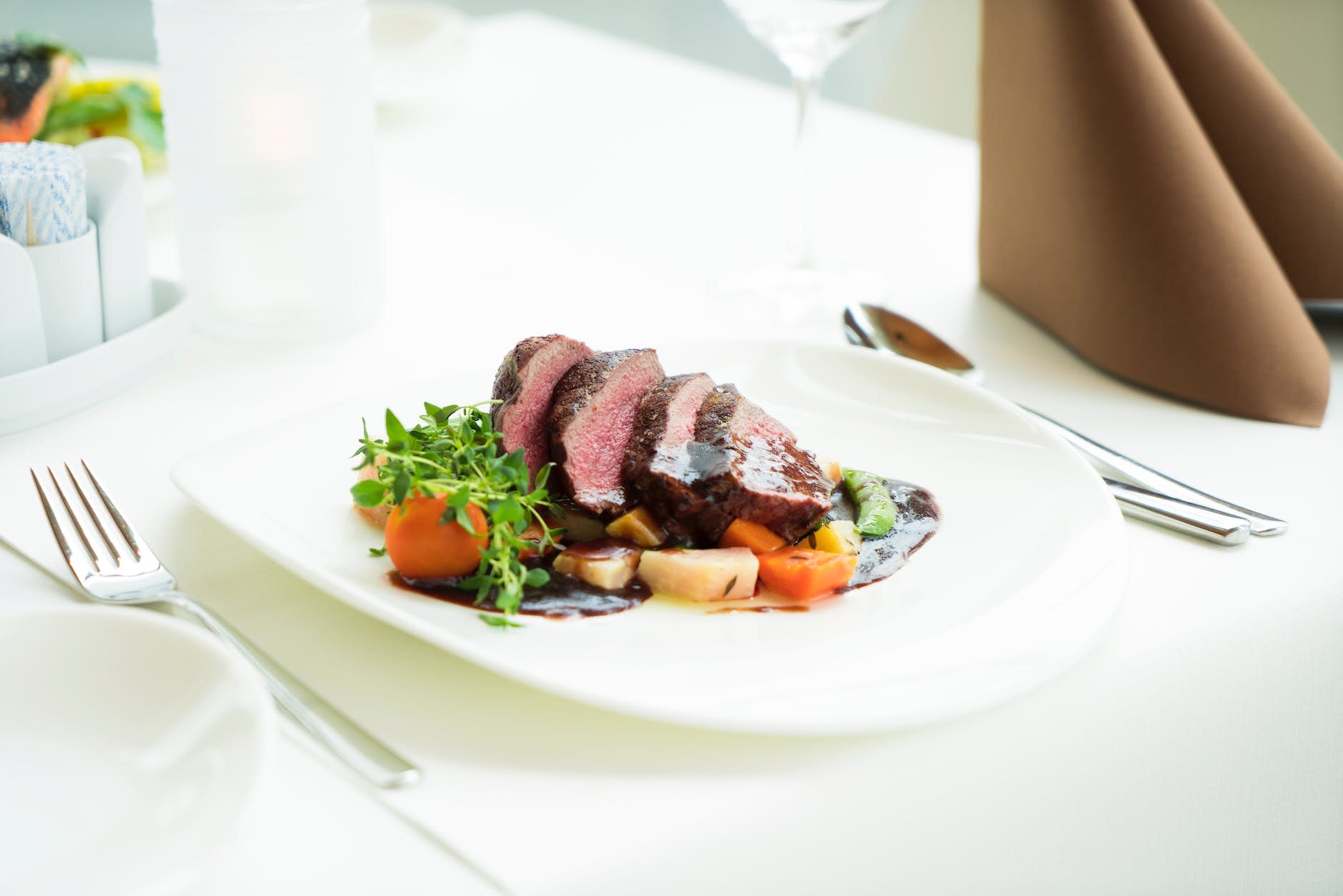sliced steak on plate