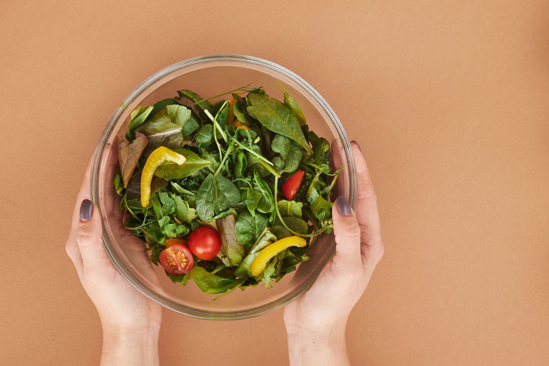 vegetable salad in clear glass bowl